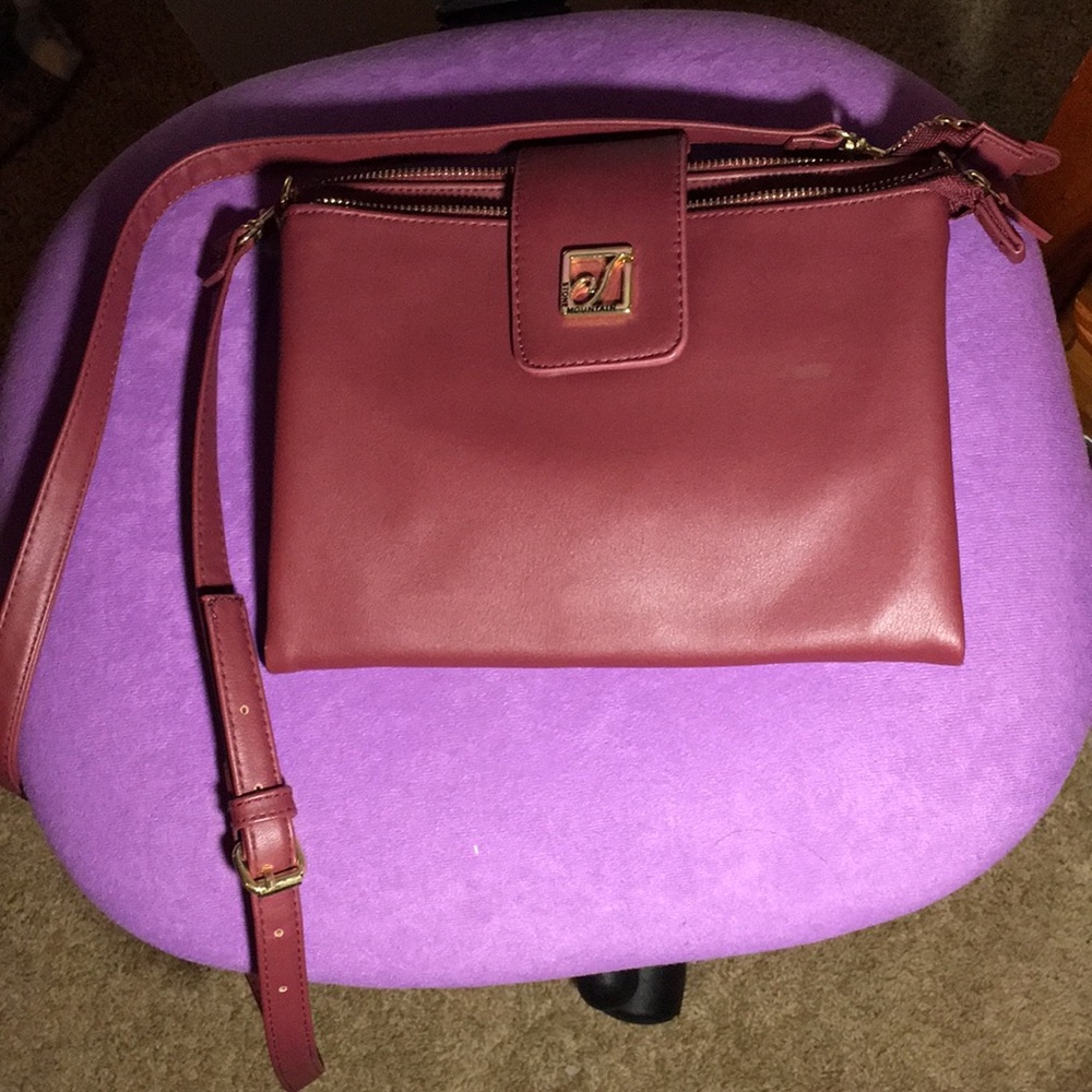 Burgundy colored purse never used